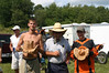 madwrench > The podium, left-to-right: Bobby Kau took1st Place B Class, Dirty Dan (aka Sean) overalled it again, and Ryan Moss walked away with the 1st Place A Class custom trophy.
That's Bob Kau in the far left background....but photographs don't have sound ;-)
